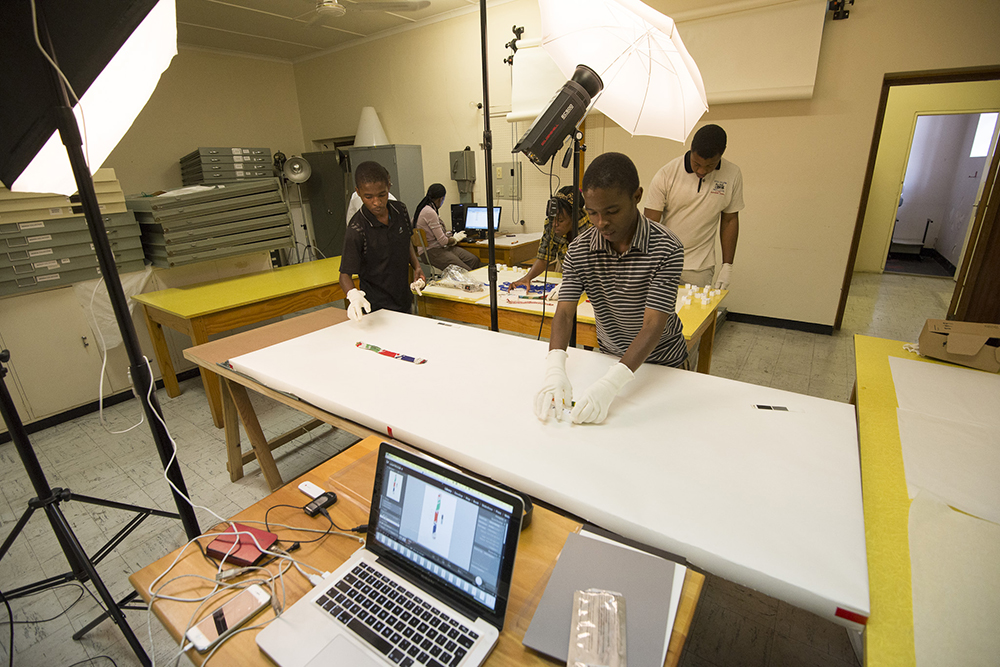 The Africa Media Online digitisation team digitising museum artifacts at the KwaZulu-Natal Museum Services in 2013. Africa Media Online works with many organisations including museums, archives, media organisations, media professionals, corporates and NGOs to enable them to get their valuable media collections to whatever audience they want to reach.