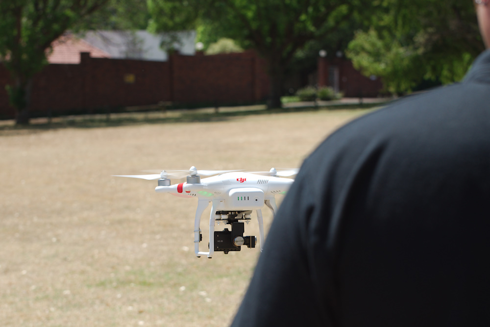 The drone will hover and, if set up correctly, remember where ground level is. 