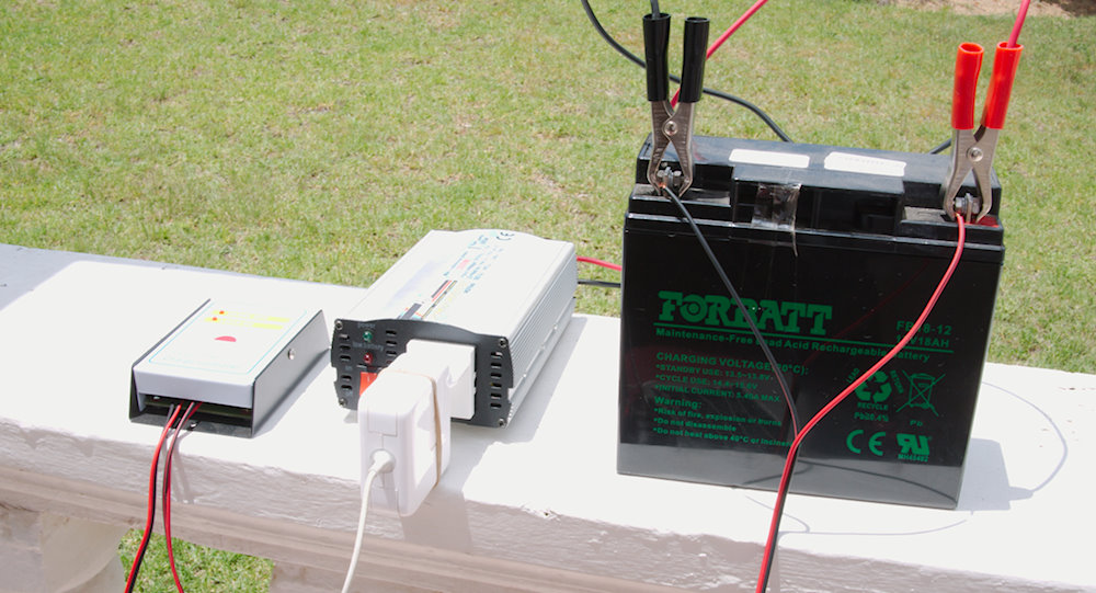 The inverter adds an extra load, and will eventually drain the battery even if your gear is off. 