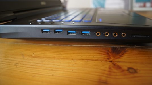 4 USB 3.0 ports, one input, one output, a mic and headphone jack, all on one side of the notebook.