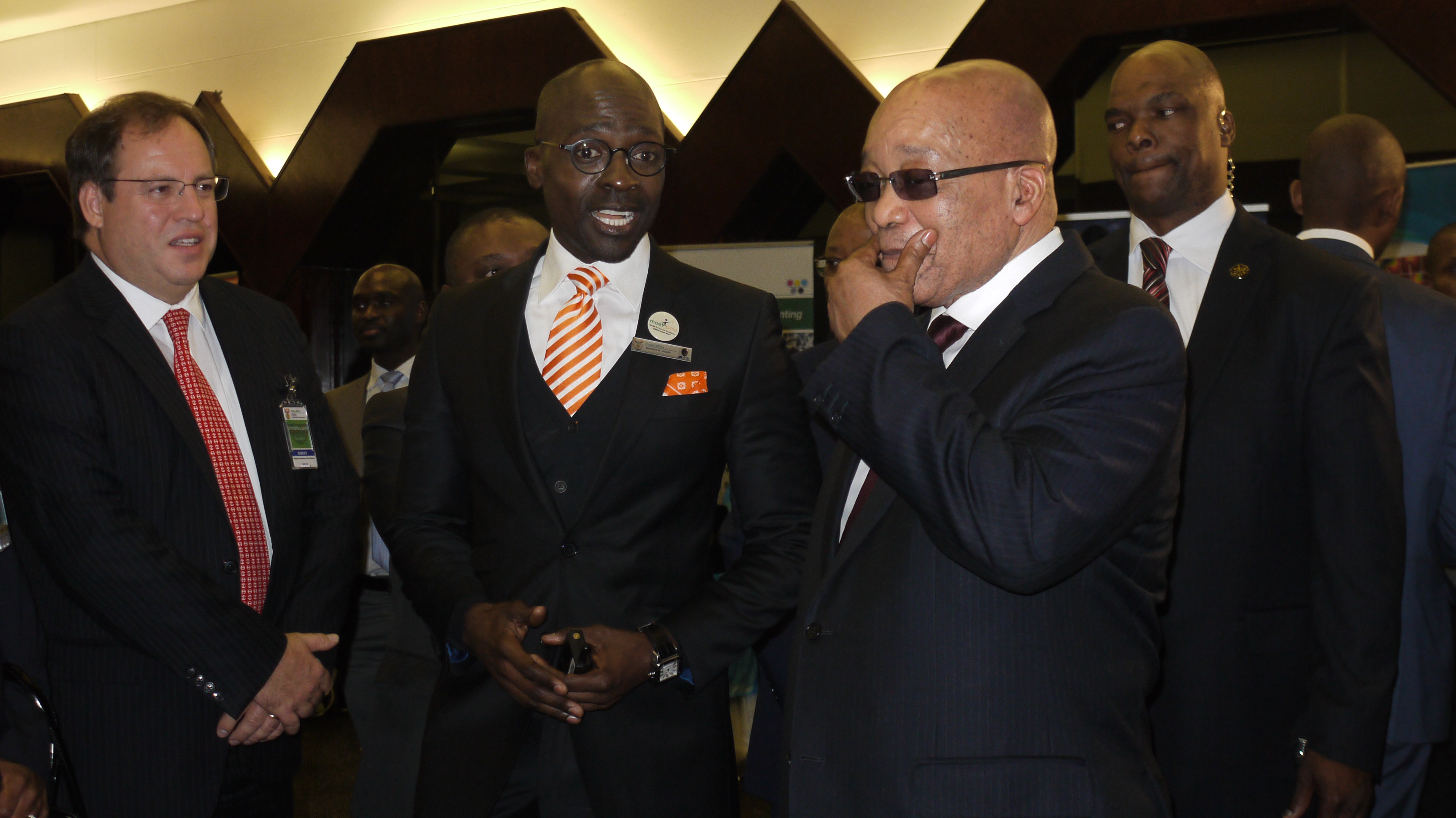 Minister of Home Affairs, Malusi Gigaba, takes President Jacob Zuma on a tour of the bank centre demonstration exhibit