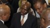 SABC COO, Hlaudi Motsoeneng, chats to his colleagues after the hearing.